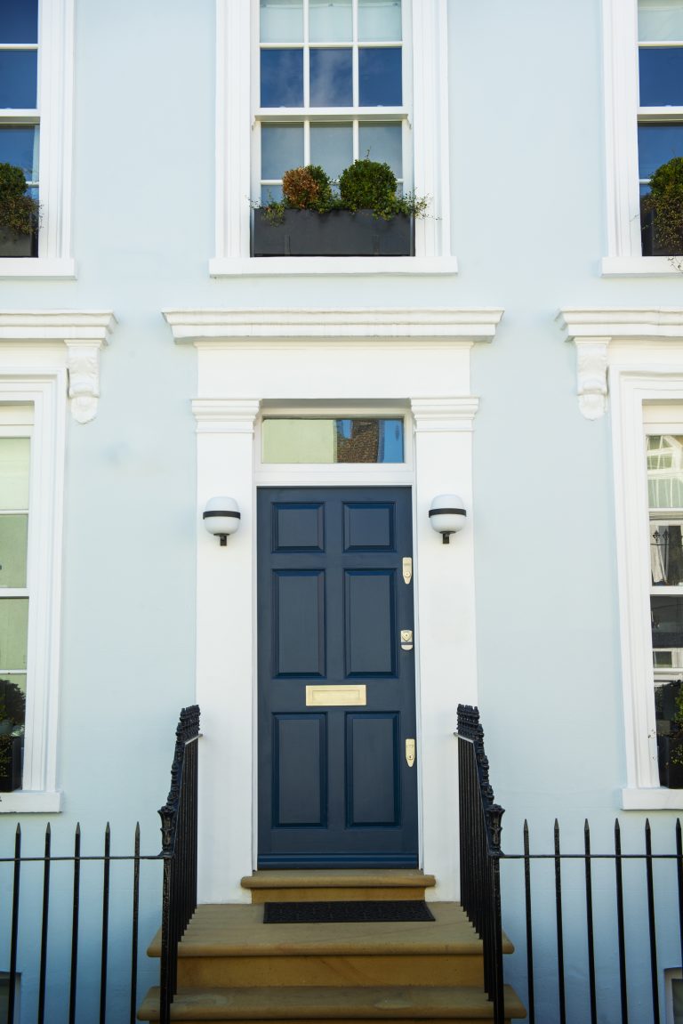 front-view-front-door-with-blue-wall